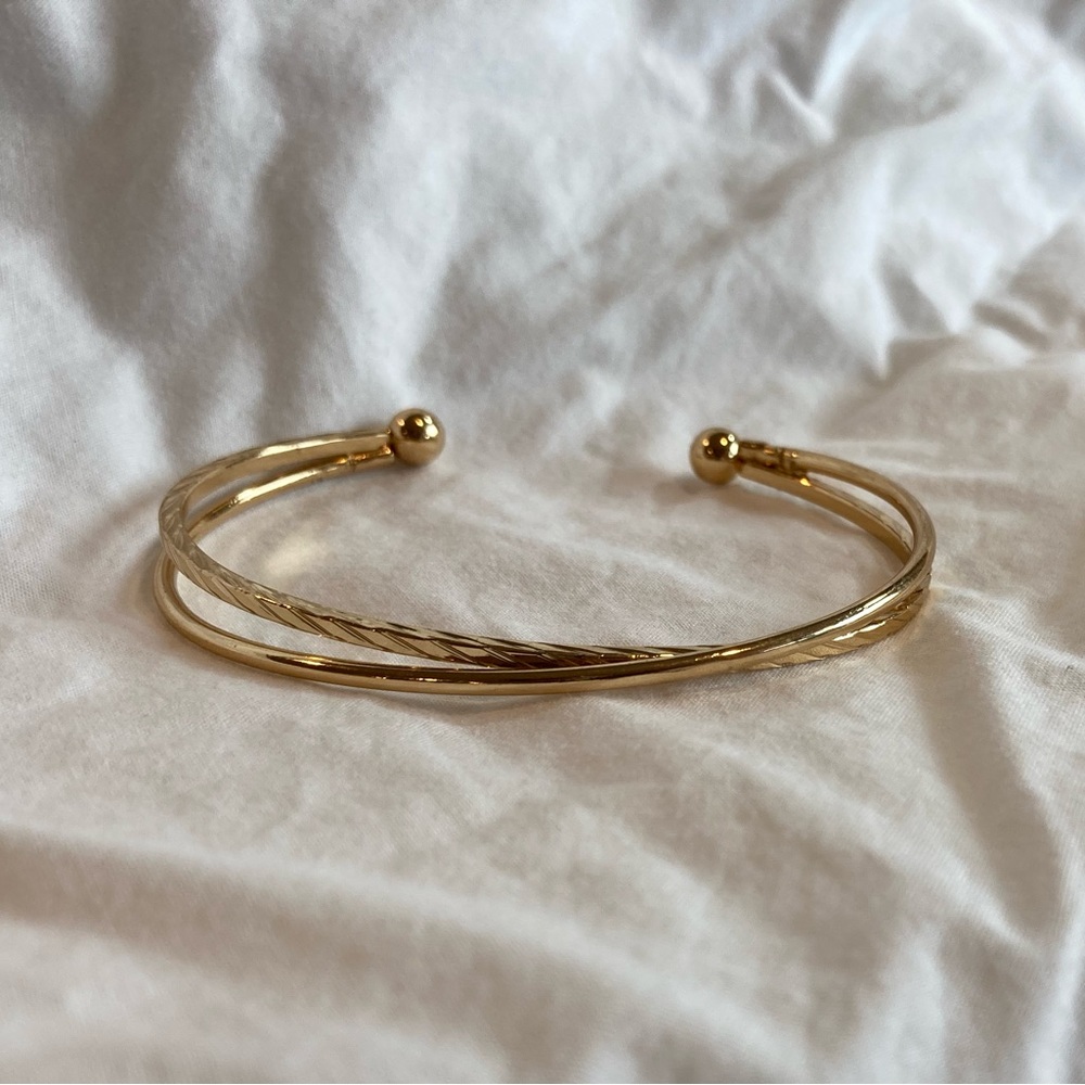 Gold bangle cusp bracelet